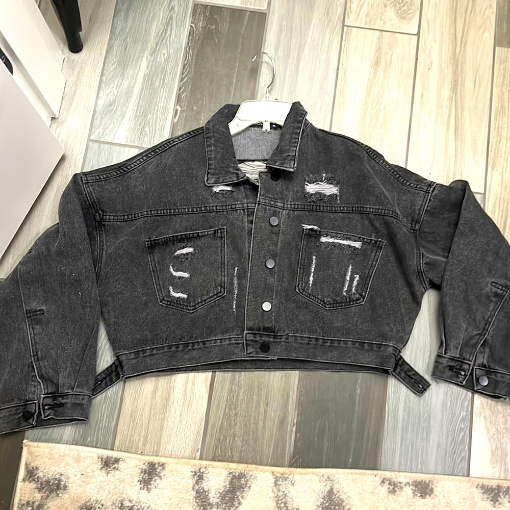 a new jacket just bought but doesn’t fit me really cute for a football game.
